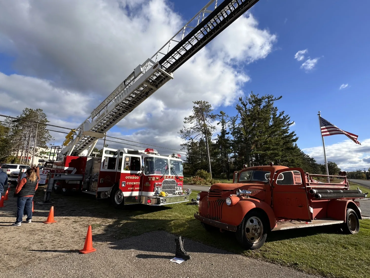 Otsego County Fire Department Tower 2 ladder truck and vintage fire truck on site for a Fill the Boot community fundraiser